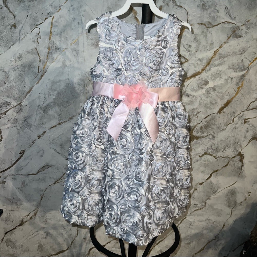 Silver satin rosette dress.